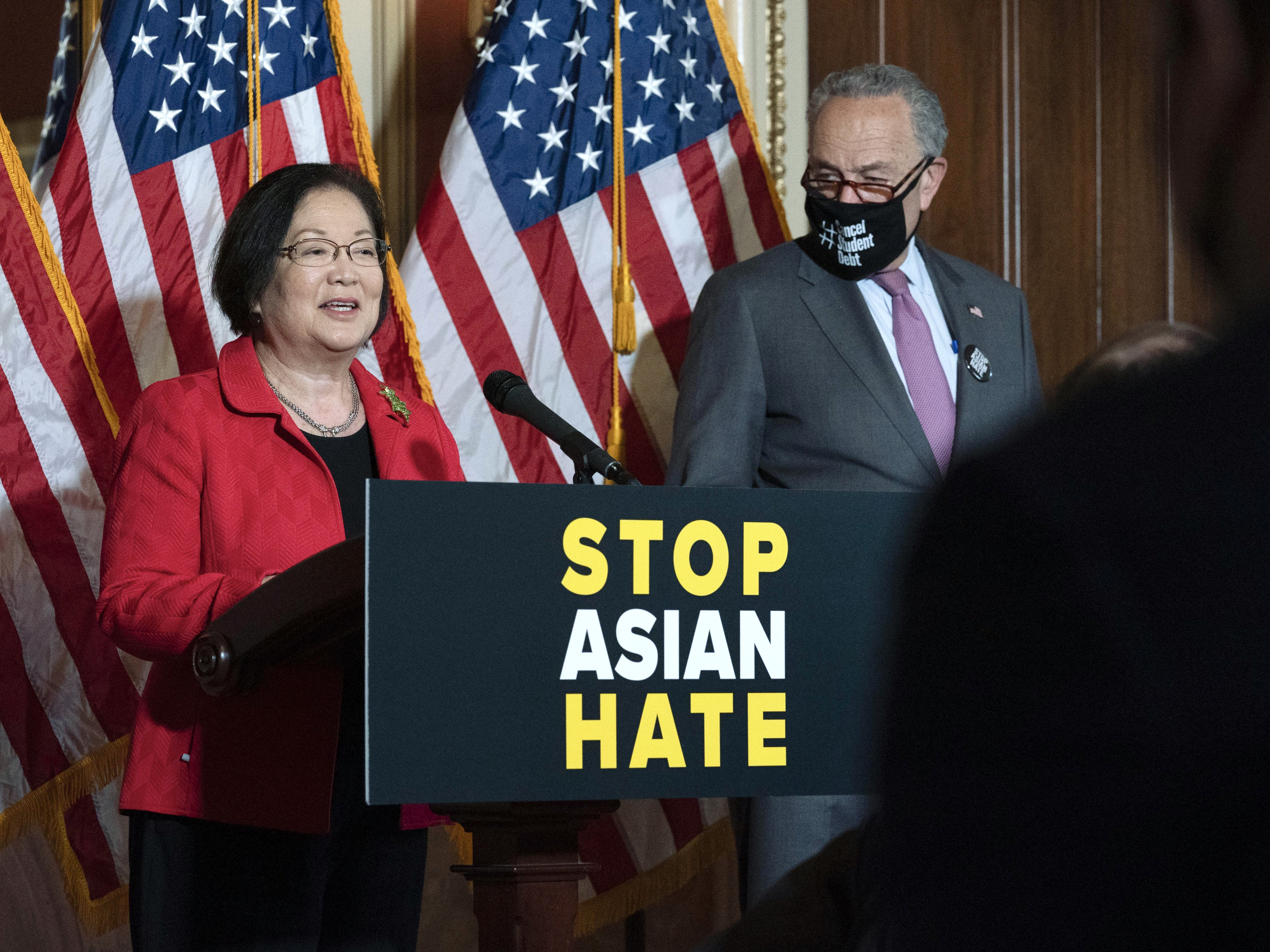 caption: Sen. Mazie Hirono, D-Hawaii, accompanied by Senate Majority Leader Chuck Schumer, D-N.Y., addresses a news conference last week in Washington. Hirono introduced the legislation in the Senate.