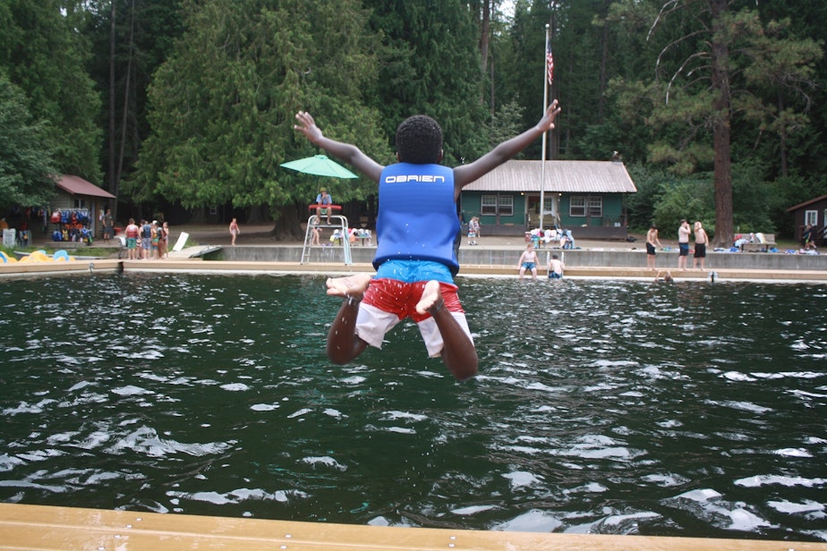 caption: The director of YMCA Camp Reed north of Spokane holds out hope to open classic summer camp in July.