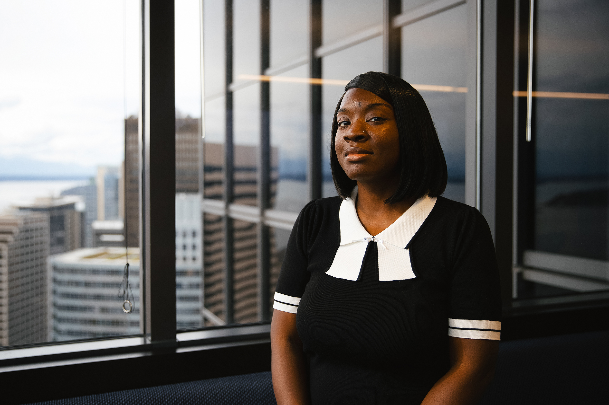 caption: Ashley Miller is portrayed on Tuesday, September 30, 2025, at the PCVA law office in downtown Seattle. 