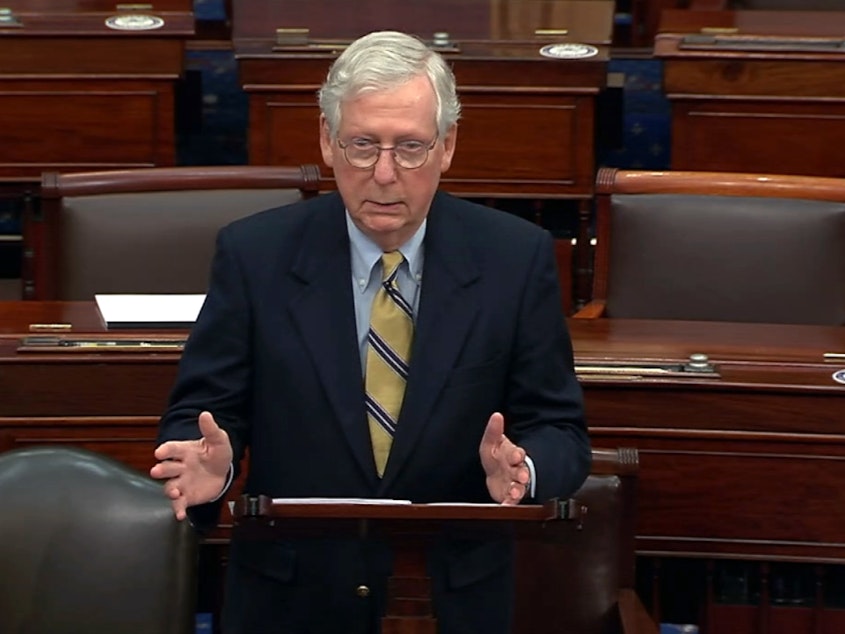 caption: Senate Minority Leader Mitch McConnell responds after the Senate voted 57-43 to acquit former President Donald Trump.