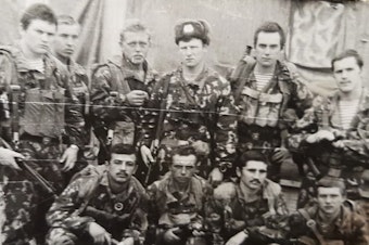caption: Over half a million Soviet troops served in Afghanistan between 1979 and 1989. Among the first deployed was Rustam Khodzhayev, seen posing here (front row, first from the left) with his special operations unit in 1981.