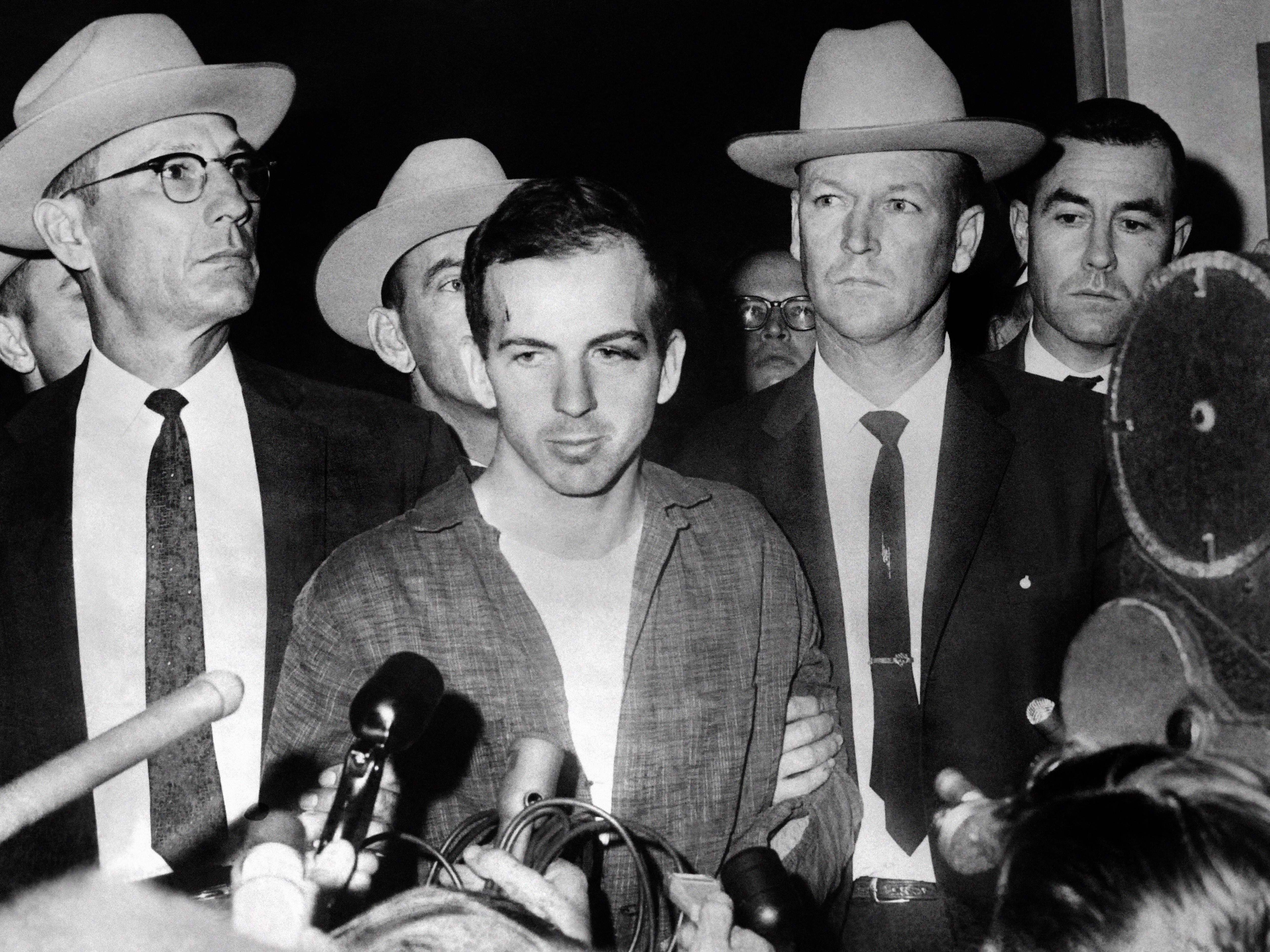 caption: President John F. Kennedy's assassin, Lee Harvey Oswald, during a news conference after his arrest in Dallas, on Nov. 22, 1963. Oswald was killed by Jack Ruby two days later, on the eve of Kennedy's burial.