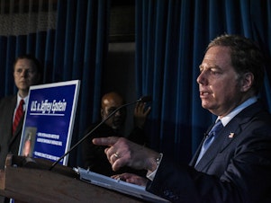 caption: US Attorney for the Southern District of New York Geoffrey Berman announces charges against financier Jeffery Epstein on July 8, 2019 in New York City.