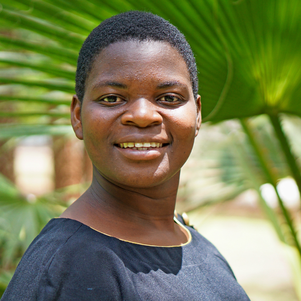 caption: Eliza Chikoti, 24, is a mentor to high school girls in Malawi. She is helping girls through their personal problems amid the pandemic — and encouraging them to stay in school.
