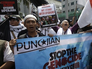 caption: Outside the Chinese Embassy in Jakarta, Indonesian protesters in 2018 demand an end to China's mass detention of Uighur Muslims. On Monday, the United States Commission on International Religious Freedom released its 20th annual report.