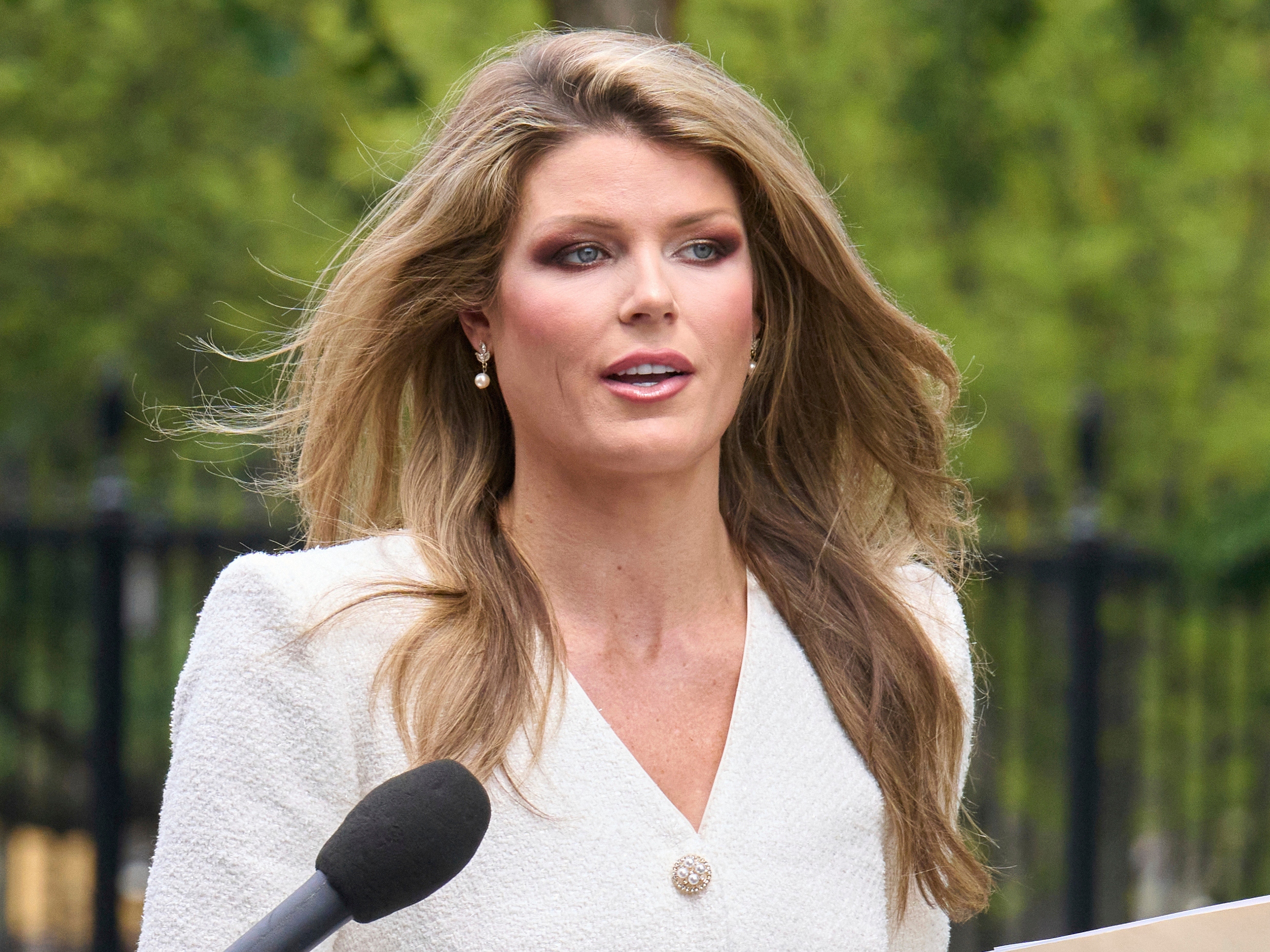 caption: FILE - Lindsey Halligan, outside of the White House, Aug. 20, 2025, in Washington.