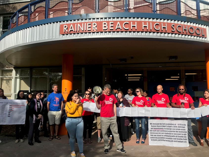 caption: Students and staff at Rainier Beach High School protesting staffing cuts at their school on May 8, 2019.