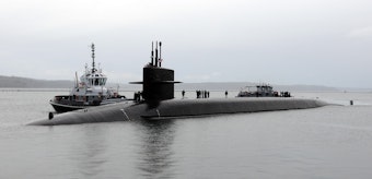 caption: The USS Maine submarine returning to its home port at Naval Base Kitsap-Bangor in January 2012.