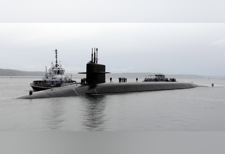 caption: The USS Maine submarine returning to its home port at Naval Base Kitsap-Bangor in January 2012.