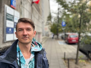 caption: Hubert Sobecki is a spokesperson for Love Does Not Exclude, an association that represents Poland's LGBTQ+ community. Sobecki says while he's encouraged that Polish voters have rejected the ruling right-wing Law and Justice party, he's not convinced that Donald Tusk's Civic Coalition represents a big change for the LGBTQ+ community in Poland.