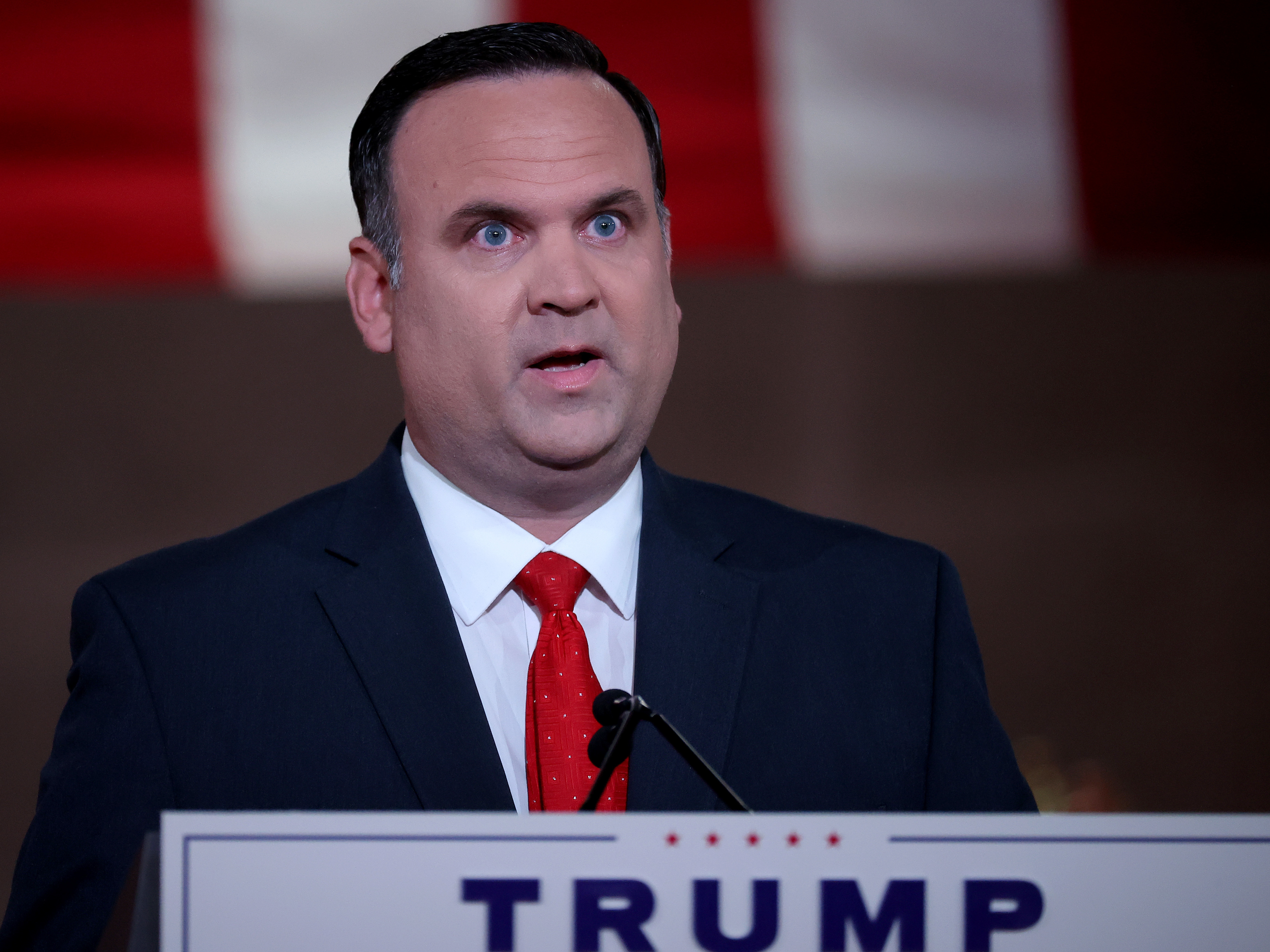 caption: Then-White House Deputy Chief of Staff for Communications Dan Scavino delivers a recorded address for the Republican National Convention on Aug. 26, 2020, in the empty Mellon Auditorium in Washington, D.C.