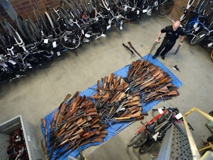 caption: Guns collected in an effort to buy back firearms in Anaheim, Calif., in 2016. The police department obtained 676 guns and gave out $100 gift cards in exchange.
