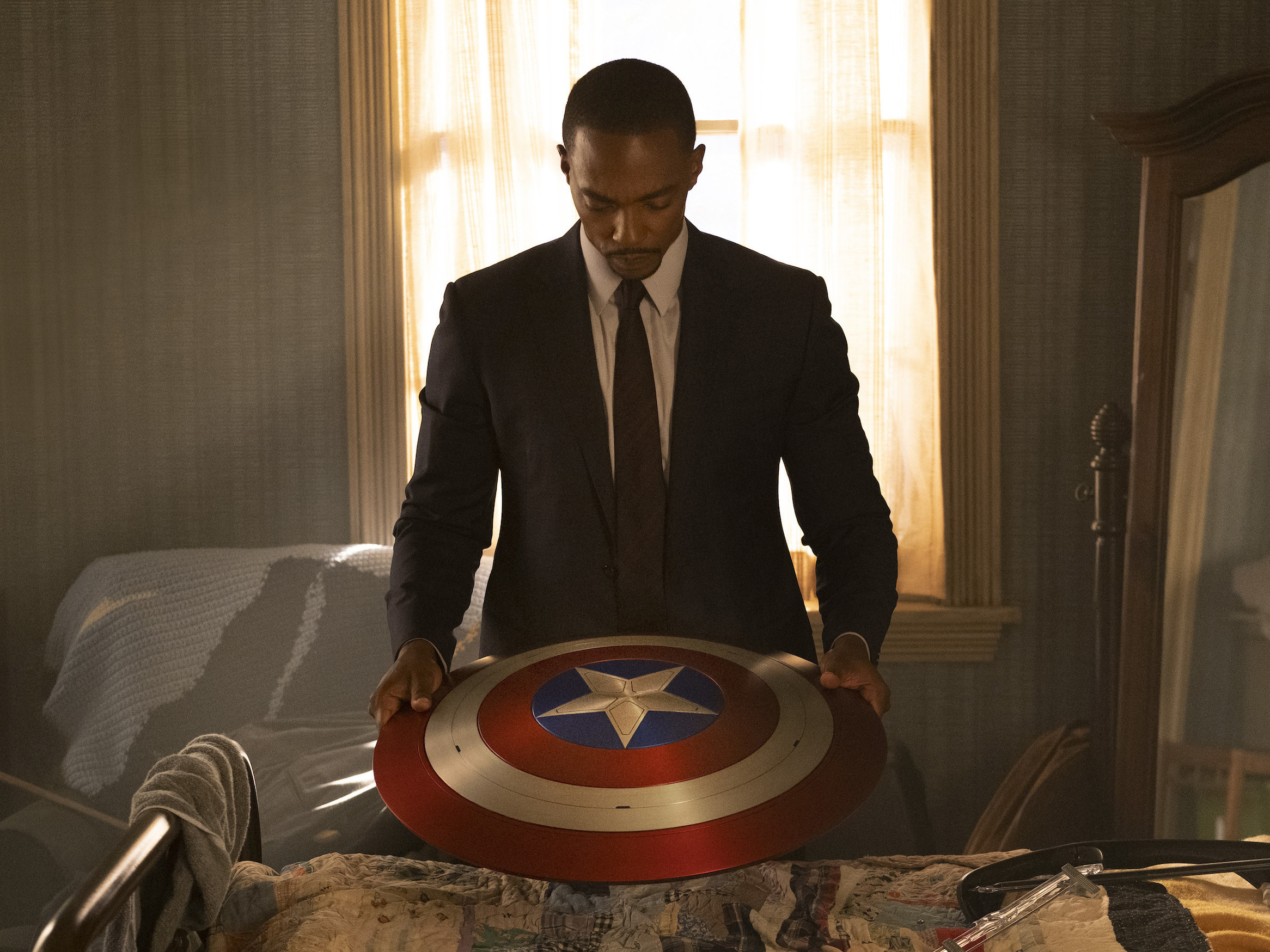 caption: <em>The Falcon and the Winter Soldier </em>explores the question of whether there can be a Black Captain America.
