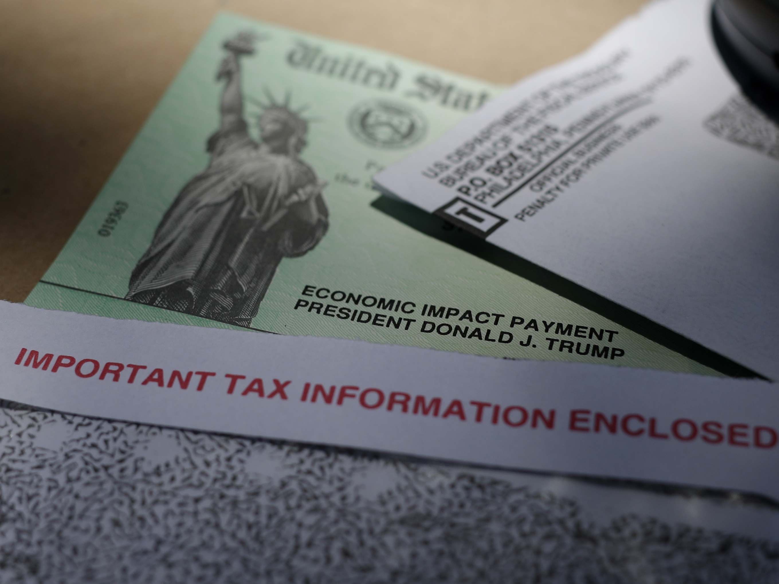 caption: An economic relief check distributed by the IRS to help with hardships caused by the coronavirus pandemic. It may take some time for the IRS to get through its backlog of work.