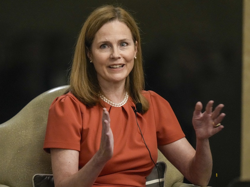 caption: Supreme Court Associate Justice Amy Coney Barrett speaks during the Seventh Circuit Judicial Conference on Monday, Aug. 28, 2023, in Lake Geneva, Wis.