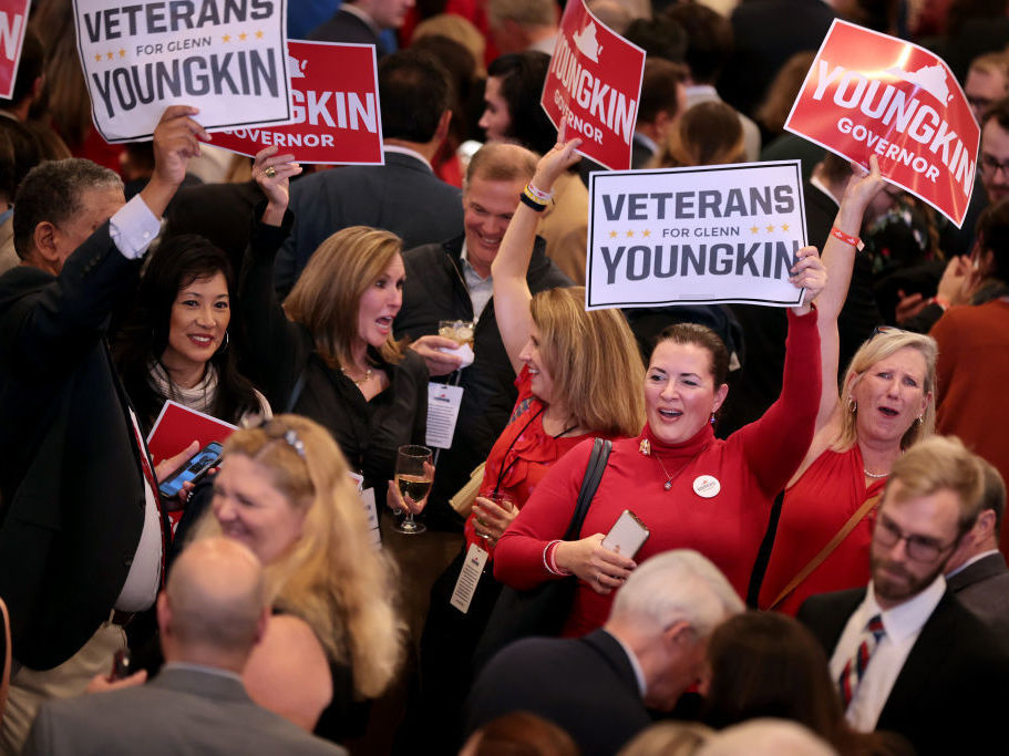 caption: Supporters of Virginia Republican gubernatorial candidate Glenn Youngkin celebrate during an election night rally on Tuesday in Chantilly, Va.