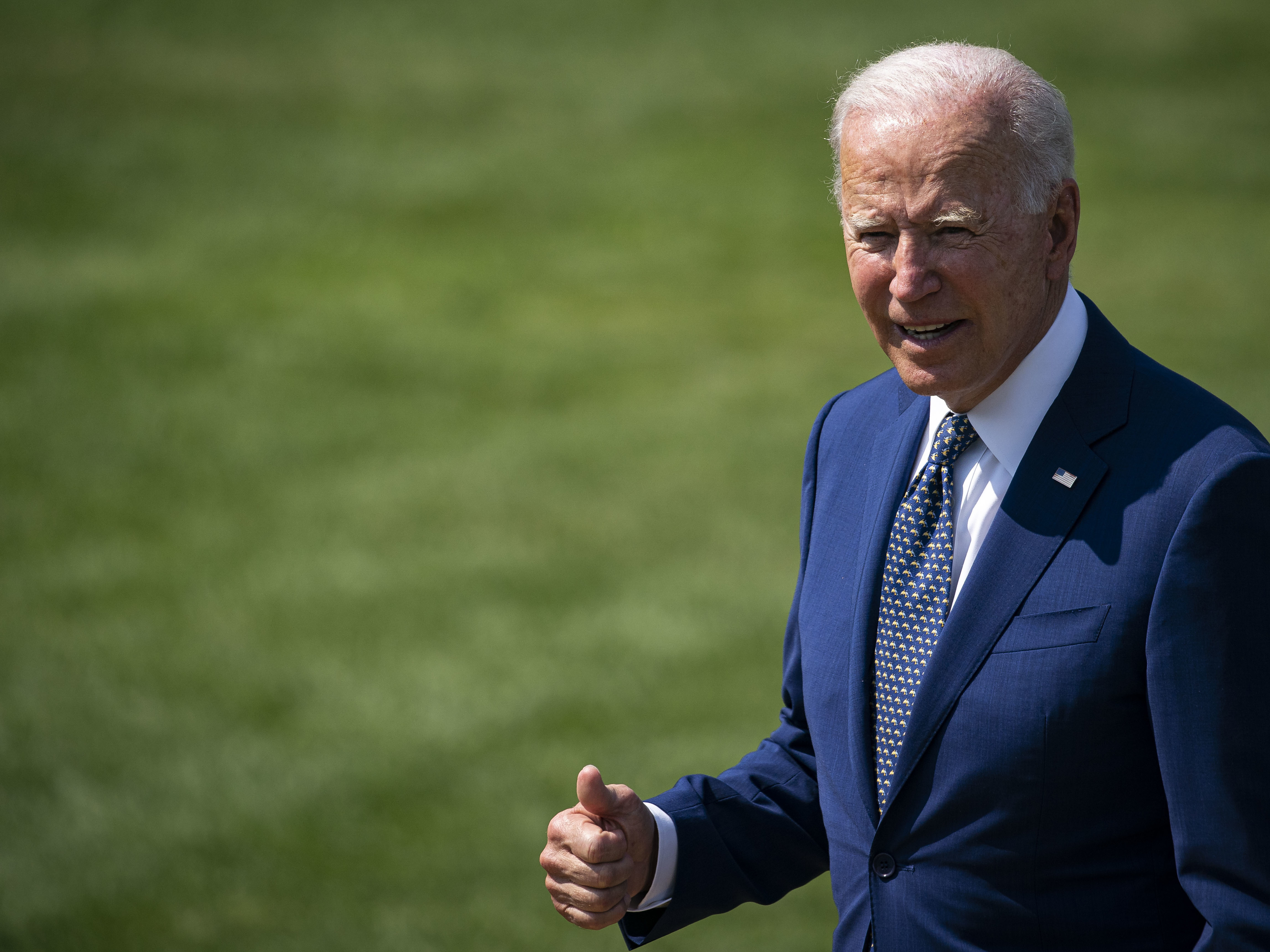 caption: President Biden praised Team USA athletes on a video call on Saturday that included special shoutouts to gymnast Simone Biles and swimmer Katie Ledecky.