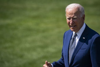 caption: President Biden praised Team USA athletes on a video call on Saturday that included special shoutouts to gymnast Simone Biles and swimmer Katie Ledecky.