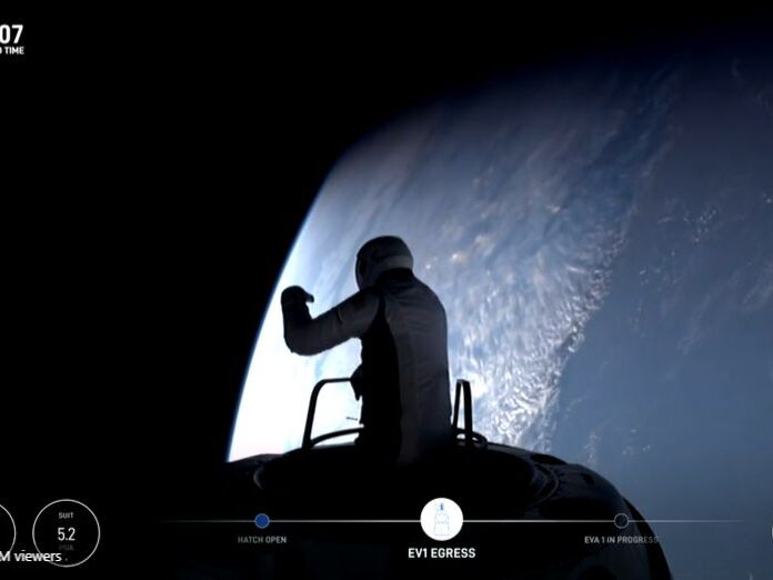 caption: Jared Isaacman, a wealthy entrepreneur who paid for the mission, was the first out of the hatch. He spent about 10 minutes looking down at the Earth below.