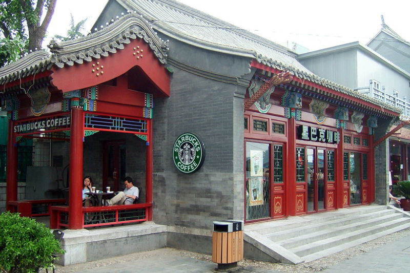 caption: A Starbucks location in Beijing, China in 2006. 