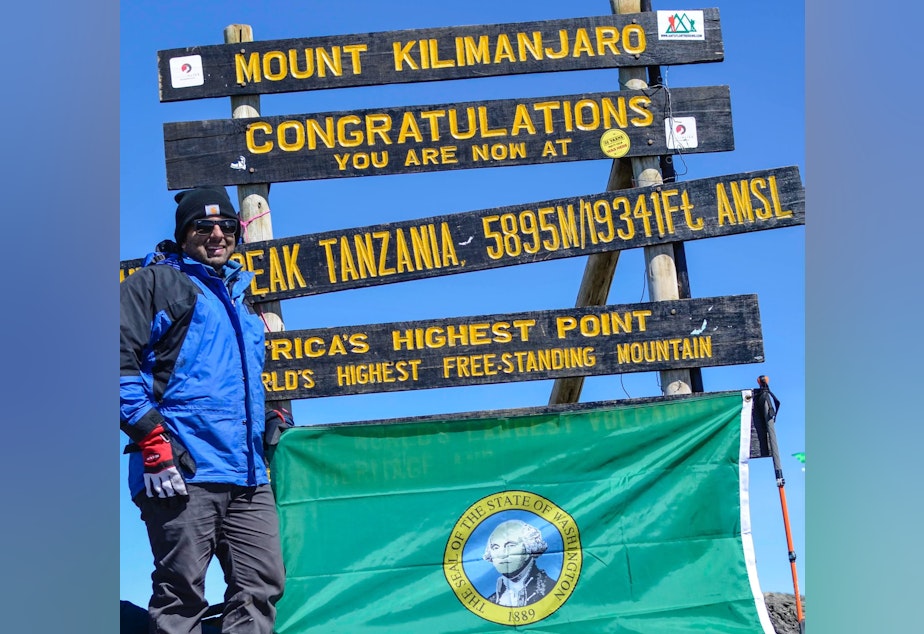 caption: Washington Lt. Gov. Cyrus Habib climbed Mount Kilimanjaro in 2019 as part of a fundraiser for an outdoor leadership program for young people with physical and sensory disabilities. 
