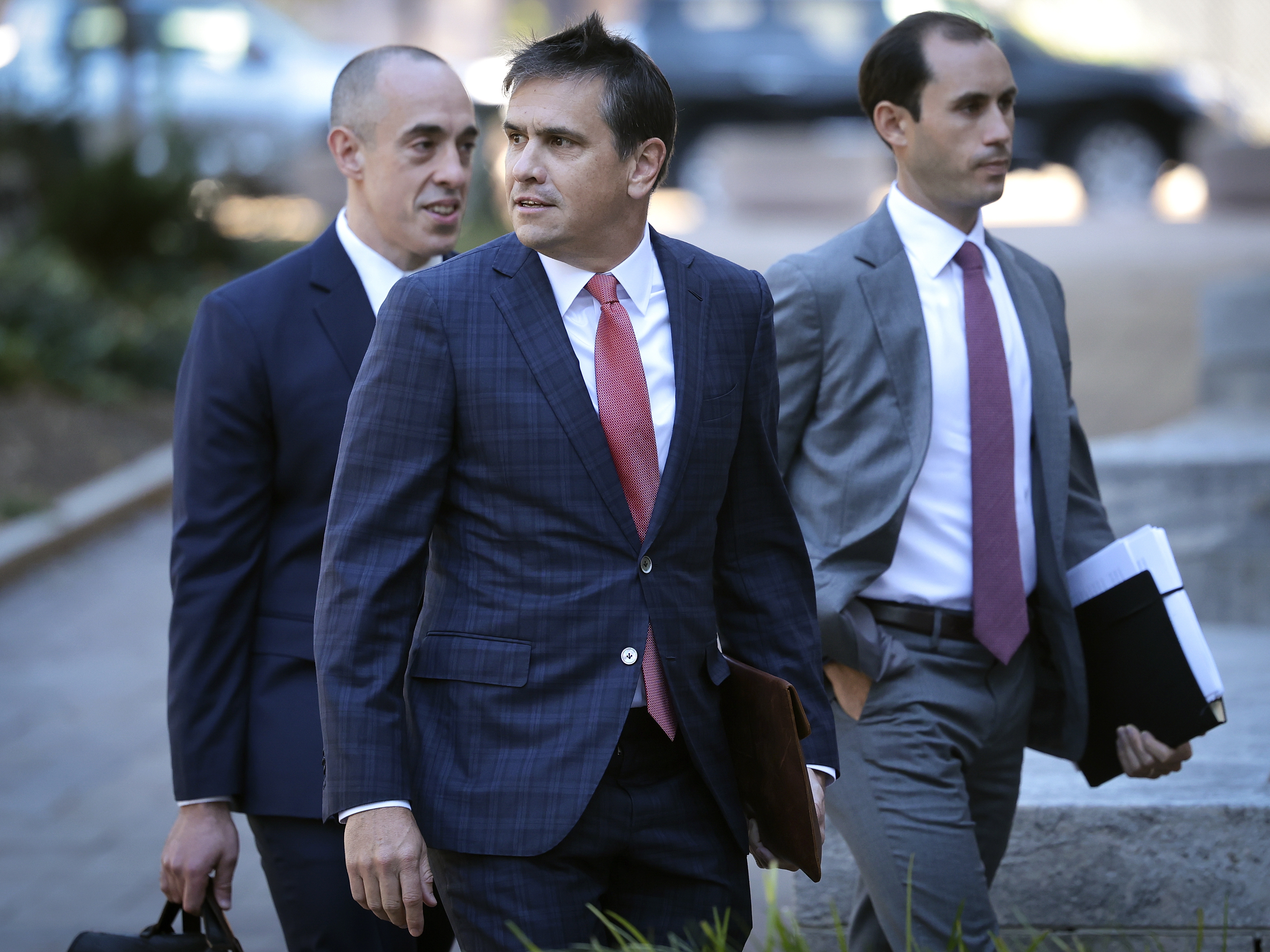 caption: Attorneys for former President Donald Trump Todd Blanche (C) and Emil Bove (L) arrive at the court house in 2023 in Washington, D.C.