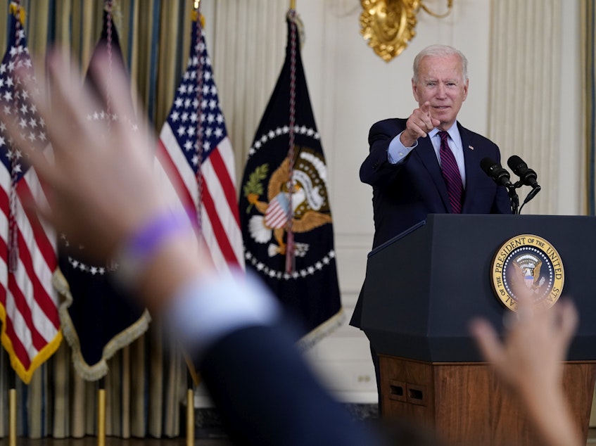 caption: President Joe Biden takes questions after delivering remarks on the debt ceiling at the White House on Oct. 4, 2021.