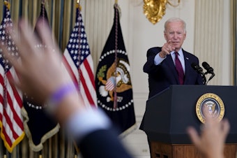 caption: President Joe Biden takes questions after delivering remarks on the debt ceiling at the White House on Oct. 4, 2021.