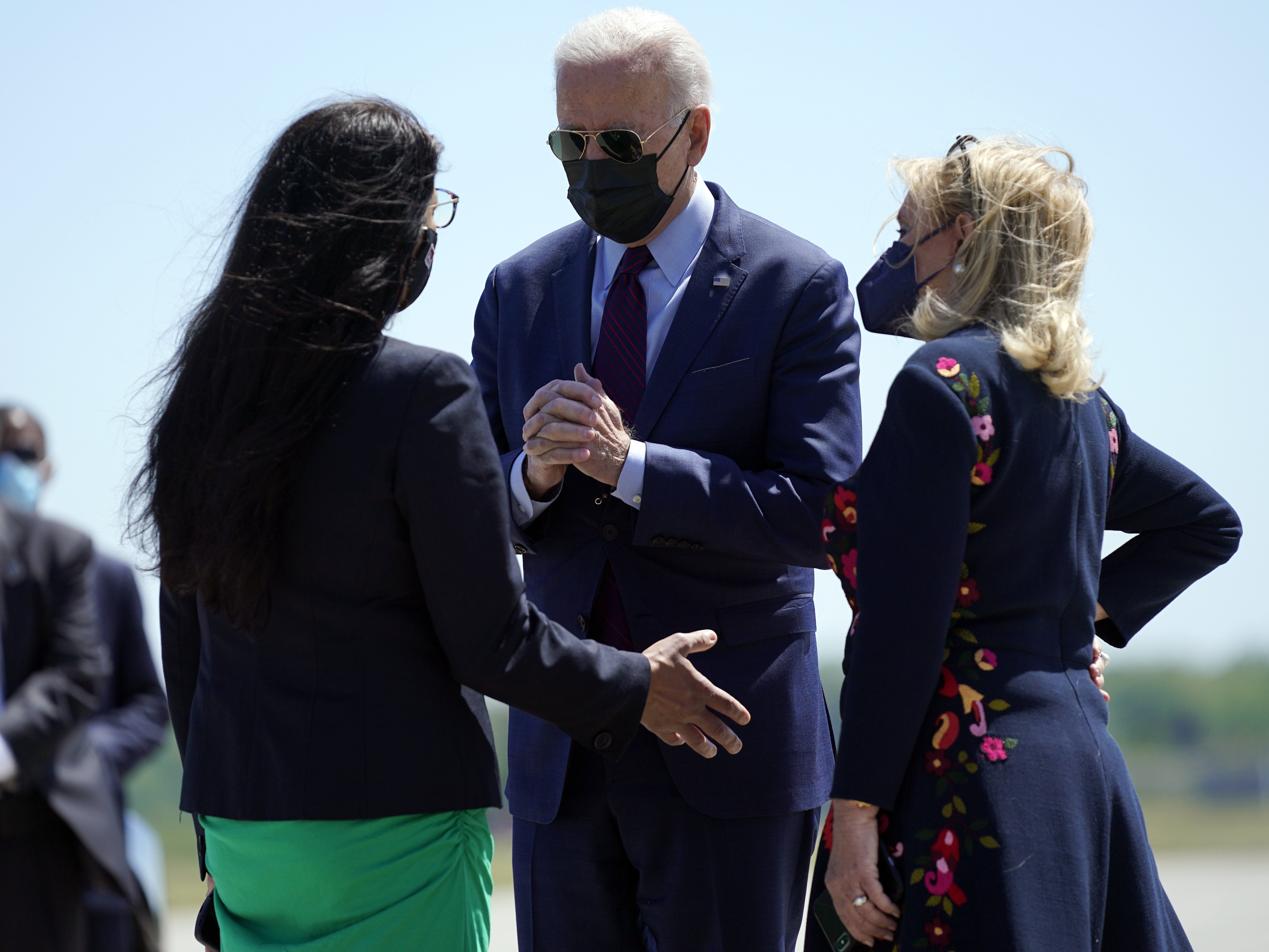 caption: Rep. Rashida Tlaib, a progressive Democrat from Michigan and the first Palestinian American woman in Congress, expressed her opposition toward U.S. policy with Israel to President Biden as he arrived in Detroit on Tuesday.