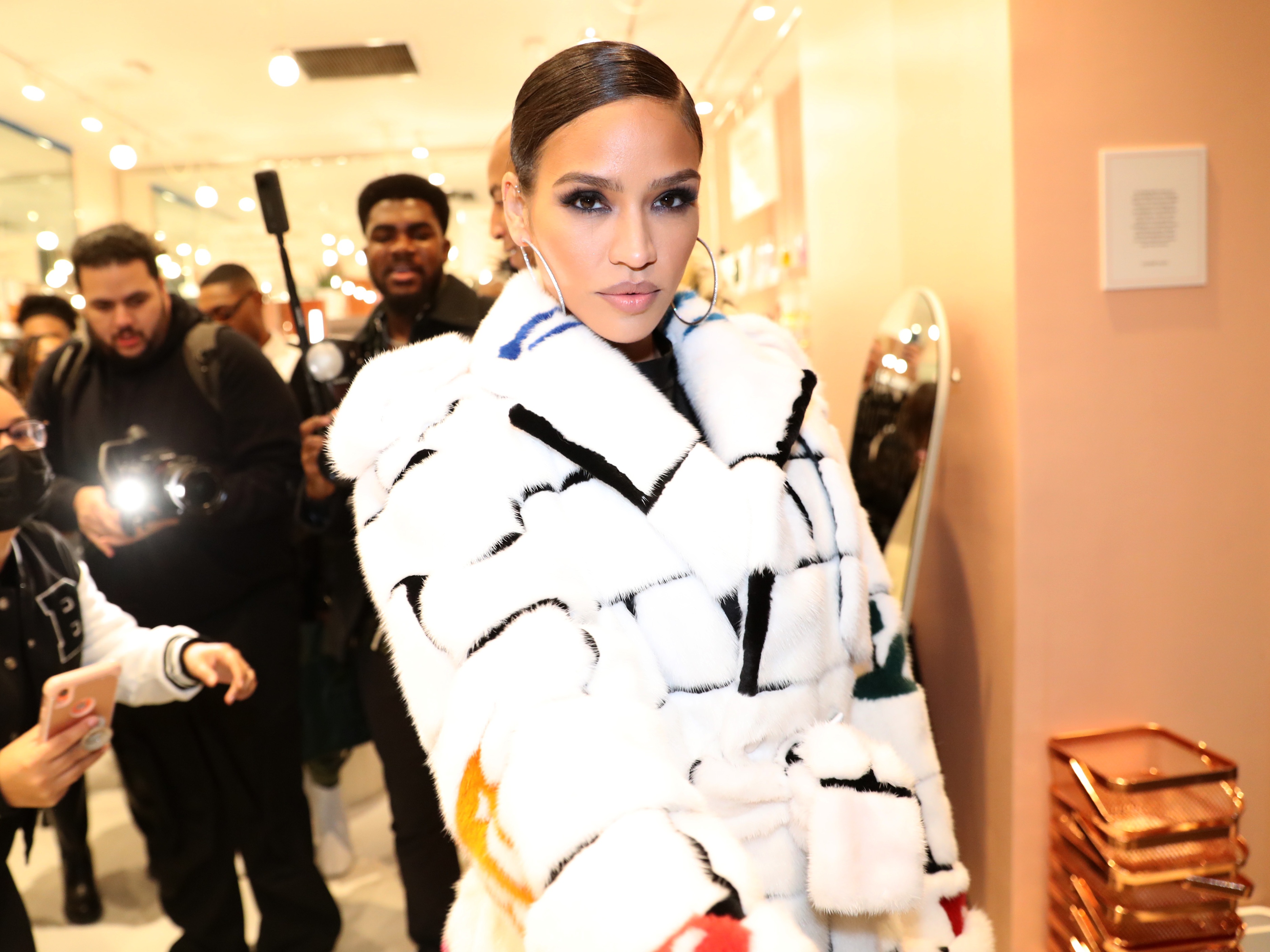caption: The musician Cassie was the first to bring a civil lawsuit against Sean 'Diddy' Combs in November 2023 — and may have opened the doors for the federal investigation that landed Combs in custody.