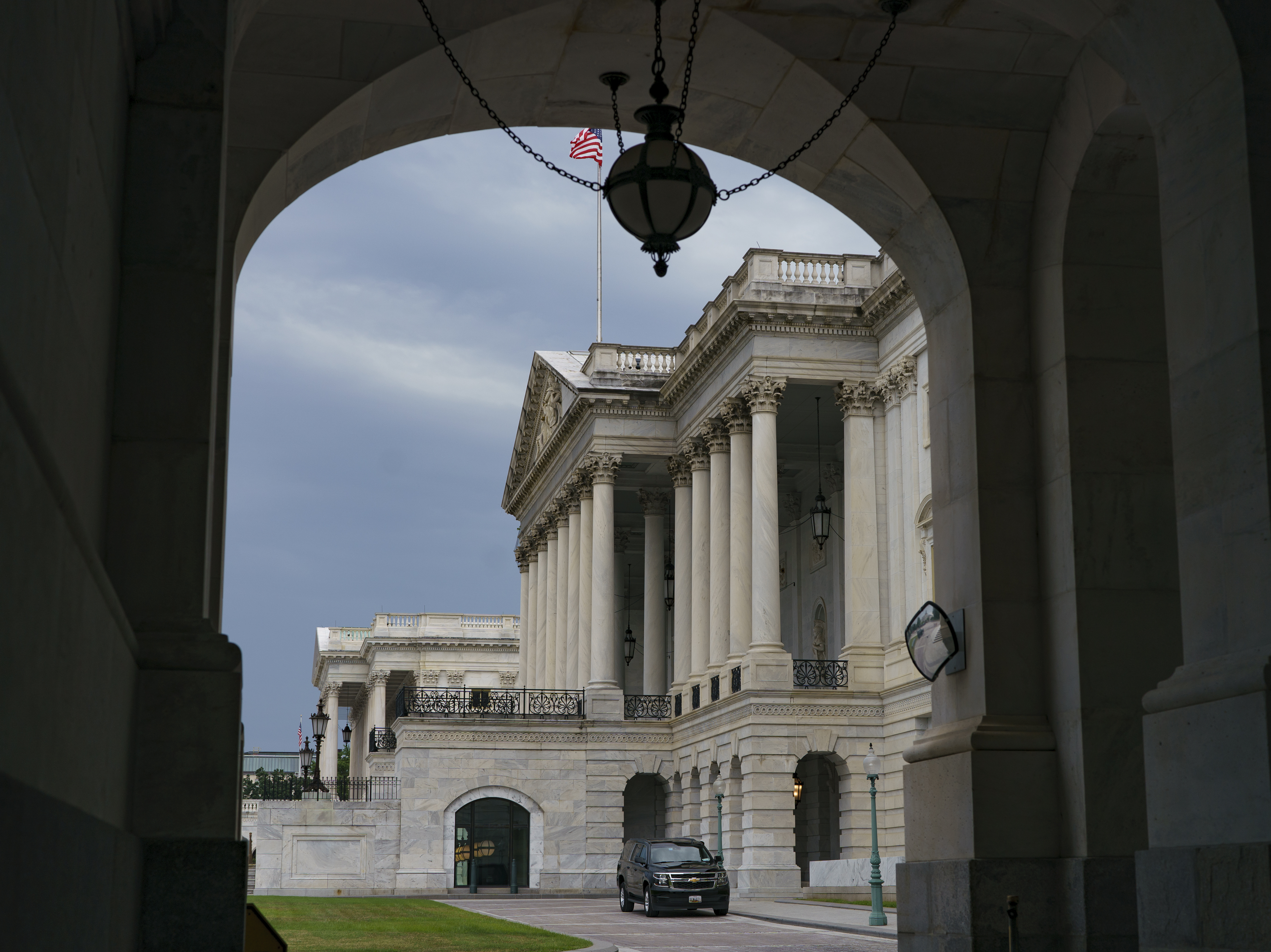 caption: The East Front of the Capitol is seen from the Senate side.