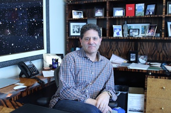 caption: Venture Capitalist Nick Hanauer, in his downtown Seattle office.