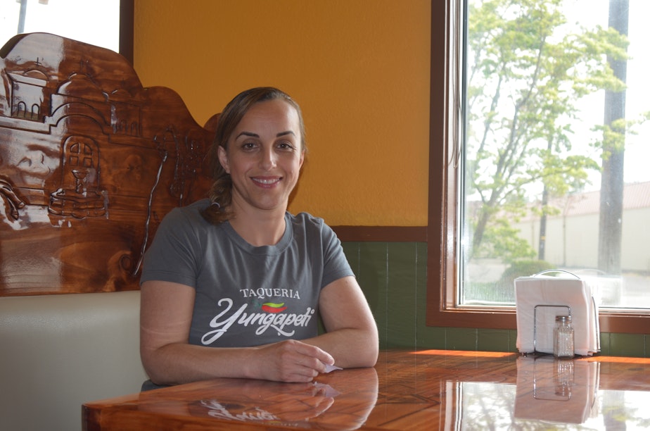caption: Claudia Reyes manages the popular Mexican restaurant her family owns, theTaqueria Yungapeti in Walla Walla.