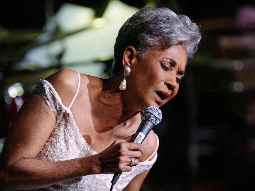 caption: Grammy-winning singer Nancy Wilson performs in 2003 at Lincoln Center's Avery Fisher Hall in New York during a concert titled "Nancy Wilson With Strings: Celebrating Four Decades of Music."