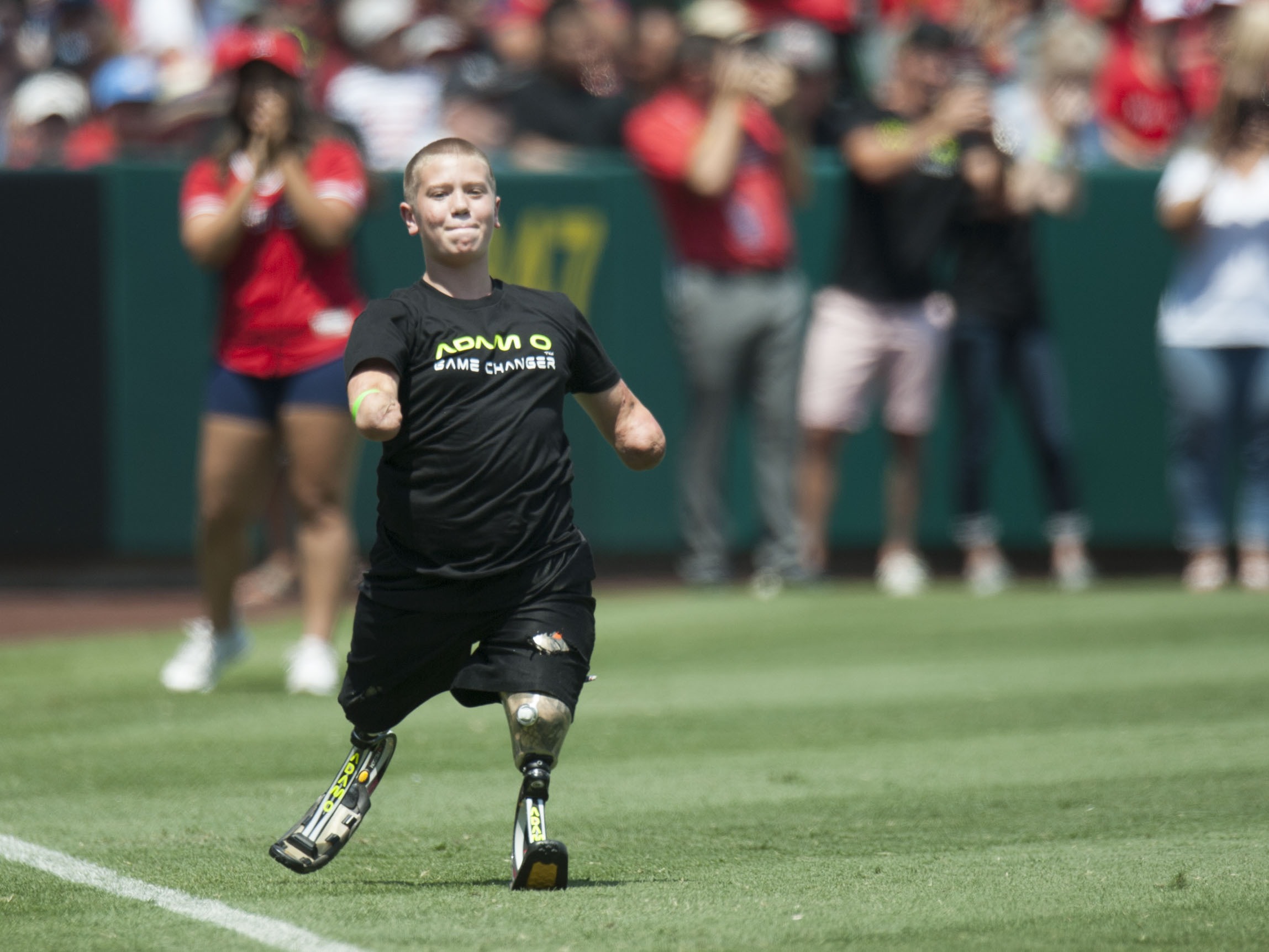 caption: Dayton Webber, then 18, pictured at a baseball game in 2016. In the years before his arrest, he shared his experience playing sports — and turning pro in one of them — as a quadruple amputee.