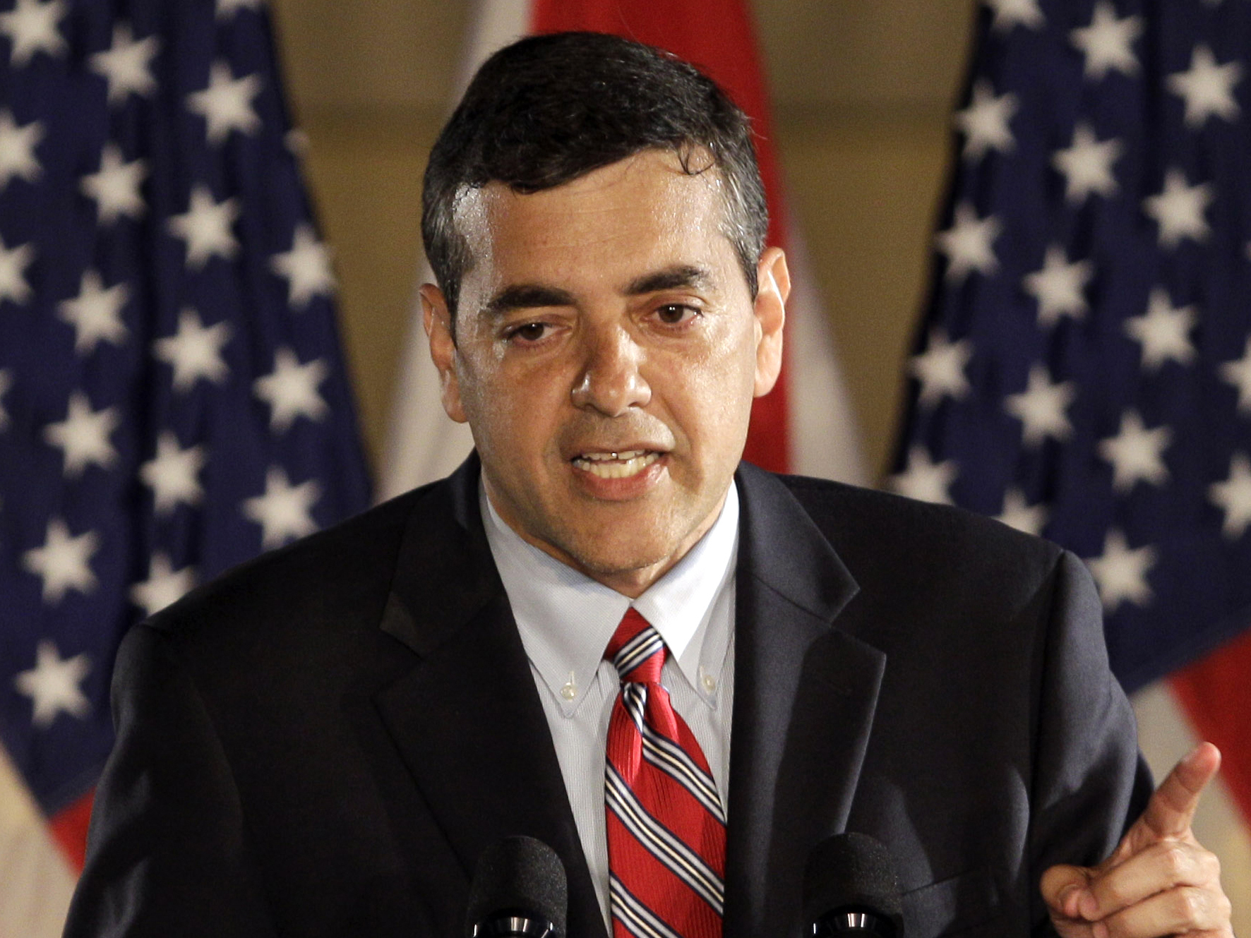 caption: In this Nov. 2, 2010, file photo, then Florida Republican congressional candidate David Rivera speaks in Coral Gables, Fla. Federal authorities say Rivera broke the law in his dealings with Venezuela's state-run oil company.