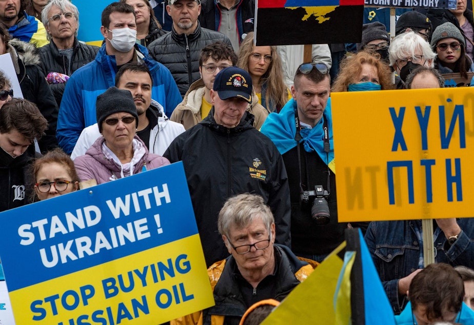caption: Protesters in Boston call for a ban on Russian oil at a rally for Ukraine on March 6.