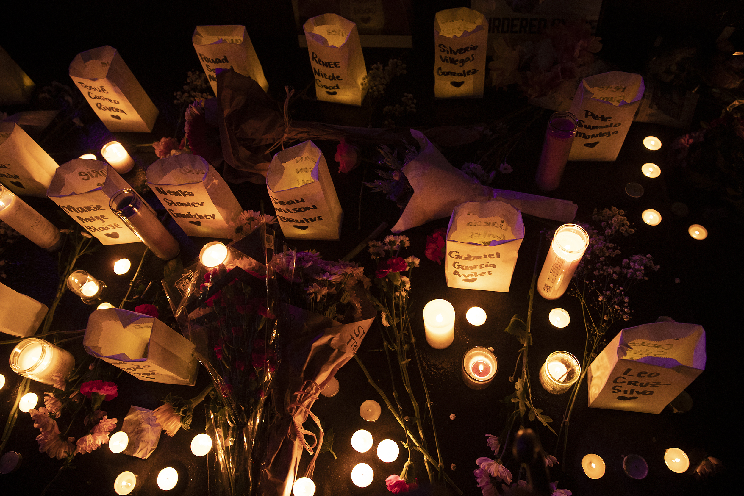 caption: A vigil honoring those killed by ICE, including Renee Nicole Good, is shown on Thursday, January 8, 2026, at Pier 58 in Seattle. 