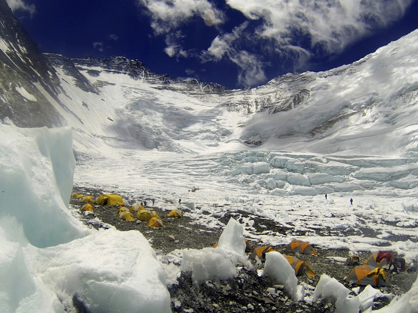 caption: Tents are pitched on Camp 2, as climbers rest on their way to summit Mount Everest on May 16, 2013. University of Washington officials say a retired Seattle doctor died on Monday, May 1, 2023, while climbing Mount Everest. Dr. Jonathan Sugarman was climbing the mountain as part of an expedition arranged by Washington state-based International Mountain Guides.