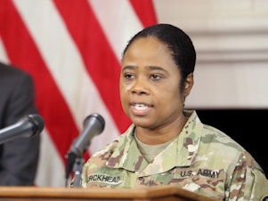 caption: Brig. Gen. Janeen Birckhead serves as Maryland's 31st adjutant general — making her the only Black woman who leads a state military in the U.S. Above, Birckhead outlines plans to improve equity in the distribution of COVID-19 vaccines during a news conference in Annapolis, Md., in March 2021.