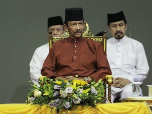 caption: Brunei's Sultan Hassanal Bolkiah attends an event on Wednesday.