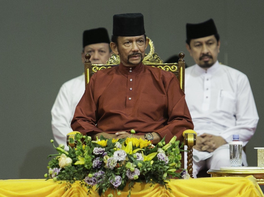 caption: Brunei's Sultan Hassanal Bolkiah attends an event on Wednesday.