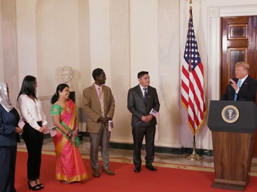 caption: President Trump hosted a naturalization ceremony for new citizens in a prerecorded video that was broadcast during the GOP's virtual convention on Tuesday. Trump and other members of his administration are facing criticism for using official resources for a political event.