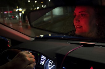 caption: Melinda Miner drives for Uber on Tuesday, September 10, 2019. She's been driving the night shift for four years, hitting the road at 11 p.m. and driving until 6 or 7 a.m. Miner drives for both Uber and Lyft.