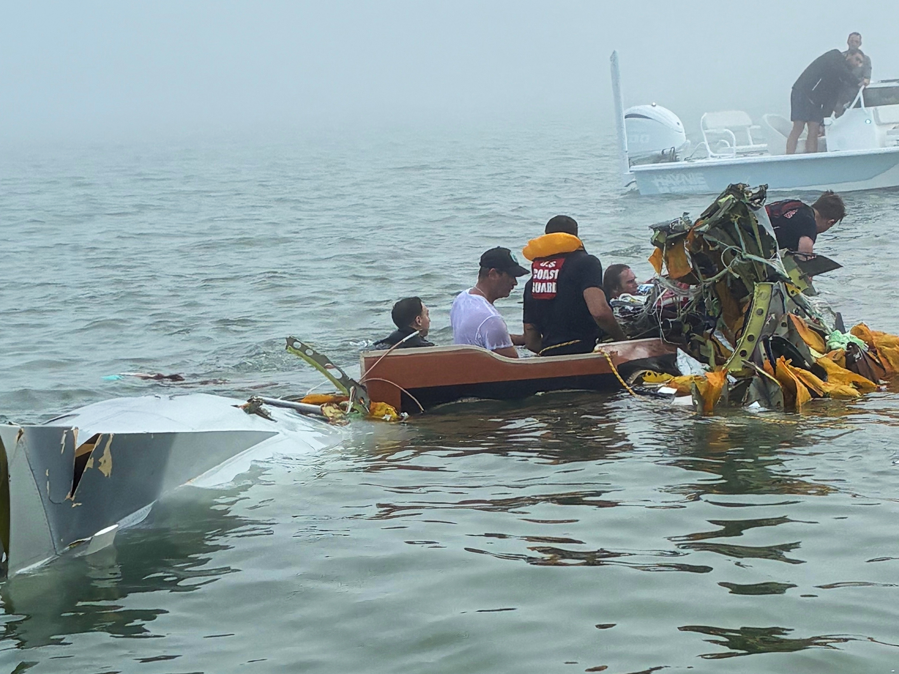 caption: In this image provided by Sky Decker Jr., authorities and volunteers respond to a Mexican Navy plane crash near Galveston, Texas, Monday, Dec. 22, 2025.