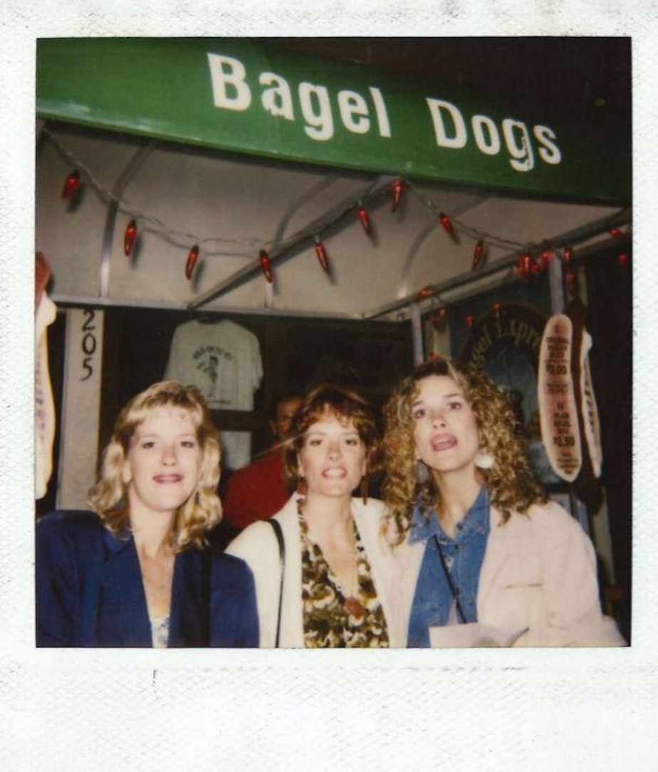 caption: A Polaroid photo of early consumers of the Seattle dog, made with grilled onions and cream cheese. Hadley Long, who had come from Carbondale, Illinois, came up with the idea.