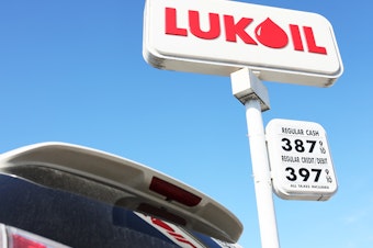 caption: A Lukoil gas station sign is seen Friday in New York City's Brooklyn borough. Lukoil, Russia's second-largest oil company, has called for an end to the war in Ukraine. The oil company is facing calls for boycotts.