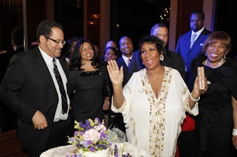 caption: Michael Eric Dyson (left) and Aretha Franklin at Franklin's birthday dinner in March 2011 in New York City.