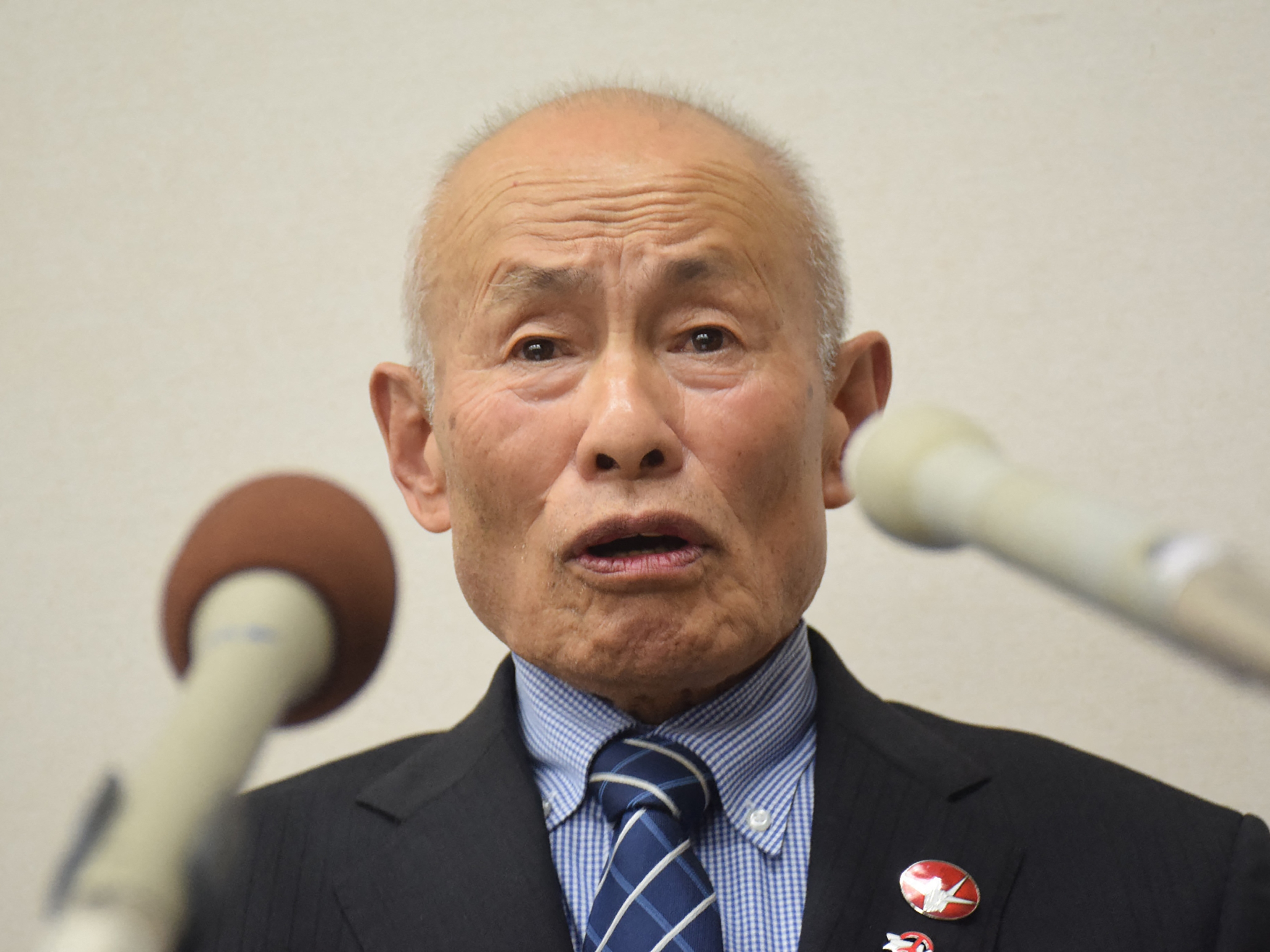 caption: Toshiyuki Mimaki, the co-chair of Nihon Hidankyo, at a press conference after the group was awarded the 2024 Nobel Peace Prize, in Hiroshima Friday.