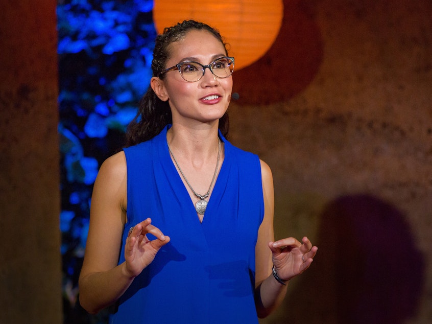caption: Leticia Gasca on the TED stage.
